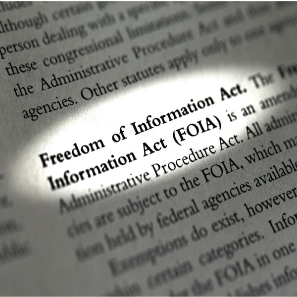 Close-up of printed Freedom of Information Act (FOIA) text highlighted on a legal document