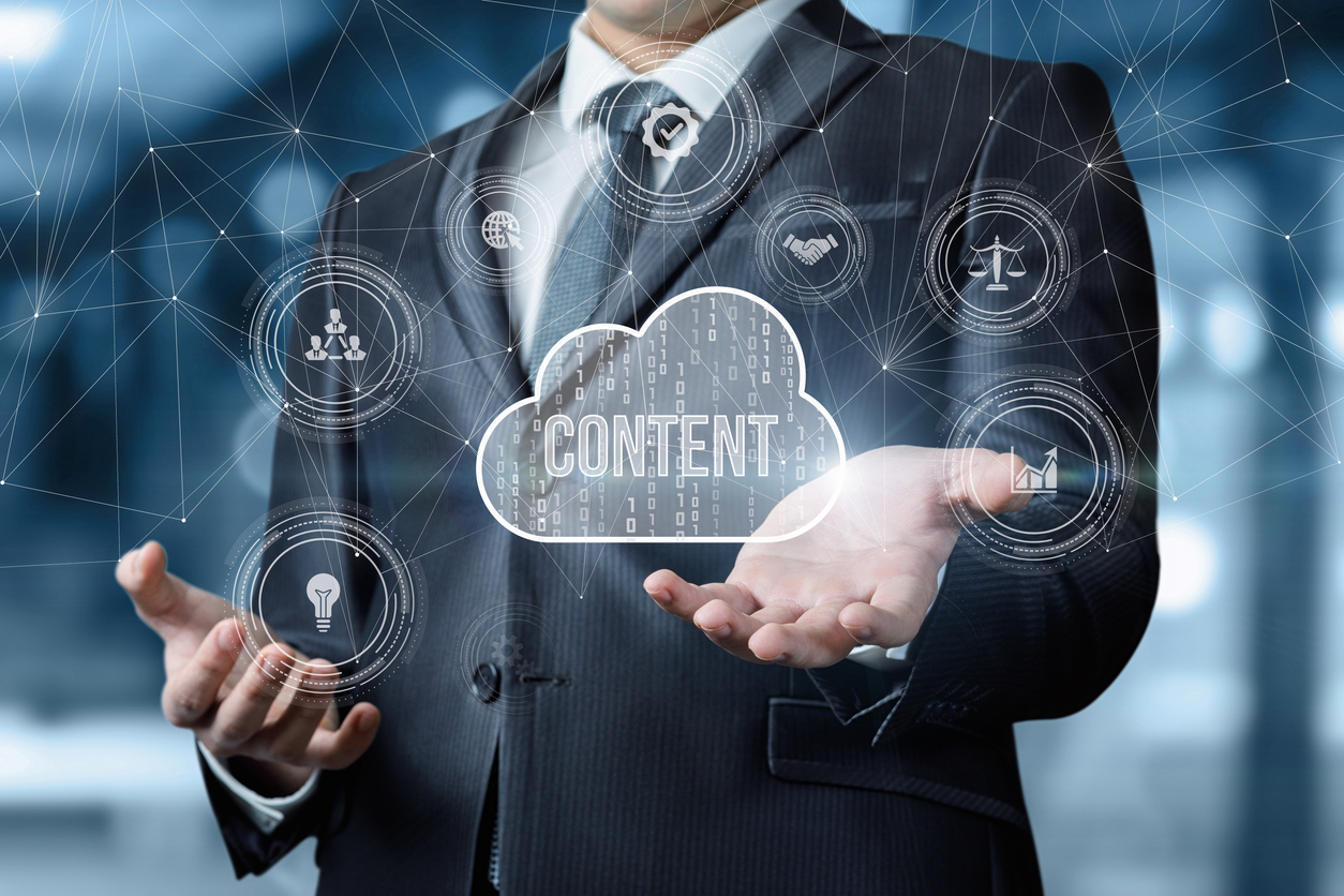Concept of storage for content. Businessman's hand shows a cloud with the inscription content.