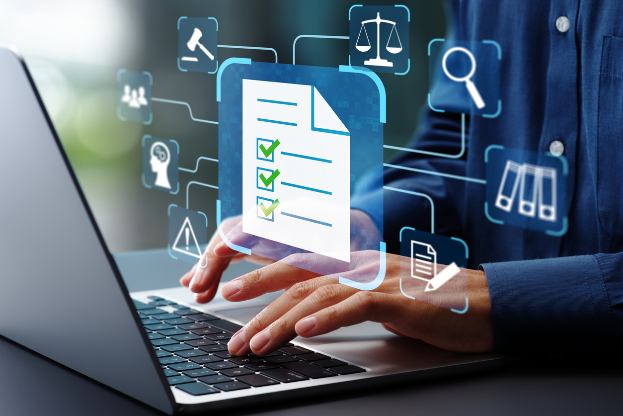Compliance management and legal document automation. Audit management and regulatory compliance. Businessman using laptop computer to make legal documents.